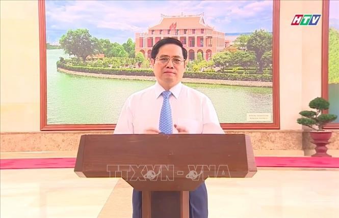Thủ tướng Chính phủ Phạm Minh Chính phát biểu tại chương trình trực tuyến (ảnh chụp qua màn hình). Ảnh: Thu Hương/TTXVN