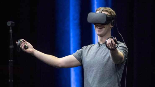 CEO Mark Zuckerberg sử dụng kính VR do công ty sản xuất tại một sự kiện.