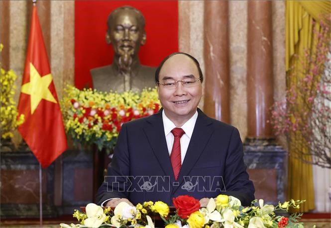 Chủ tịch nước Nguyễn Xuân Phúc chúc Tết Nhâm Dần 2022 - Ảnh: TTXVN