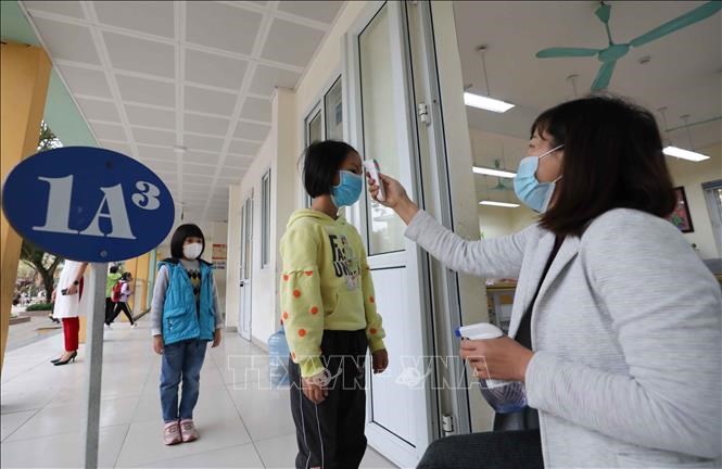 Học sinh tiểu học thuộc 12 quận của Hà Nội sẽ đi học trực tiếp từ ngày 21/2/2022 (ảnh tư liệu). Ảnh: Thanh Tùng/TTXVN