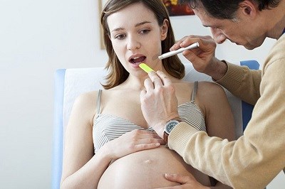Bệnh răng miệng hay gặp ở phụ nữ mang thai - ảnh 1