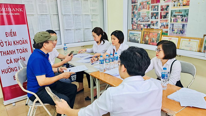 Hà Nội: Ứng dụng cơ sở dữ liệu quốc gia về dân cư trong chi trả BHXH không dùng tiền mặt