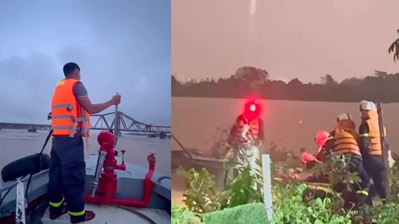  Cứu nạn, cứu hộ 3 người dân mắc kẹt tại khu vực bãi giữa sông Hồng