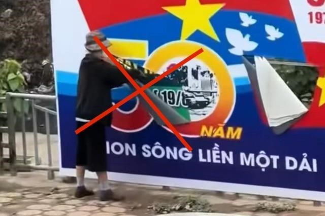 Xác minh người phụ nữ rạch áp phích chào mừng 30/4 